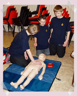 Some of the boys learning life saving techniques